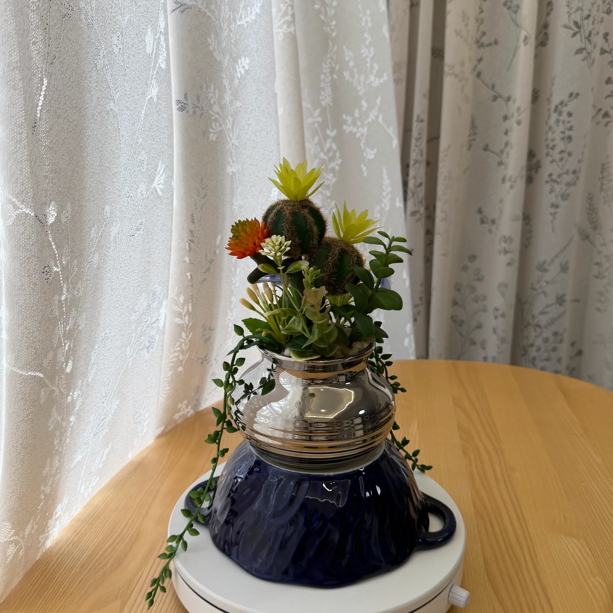 DR0076 (9) Artificial Succulent & Flower Mix in Metallic Pot